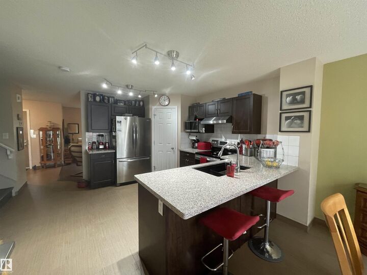 Property Photo:  9815 104 Avenue  AB T8R 0C2 