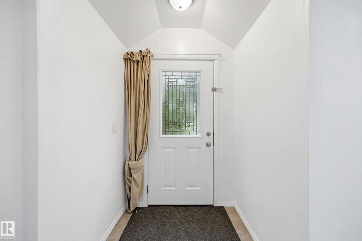 Property Photo:  10714 103 Street NW  AB T5H 2V8 