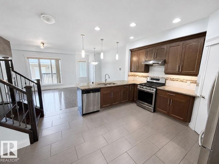 Property Photo:  12913 124 Street NW Upper  AB T5L 0P6 