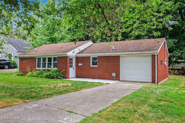 Property Photo:  1897 Hall Street  MI 48842 