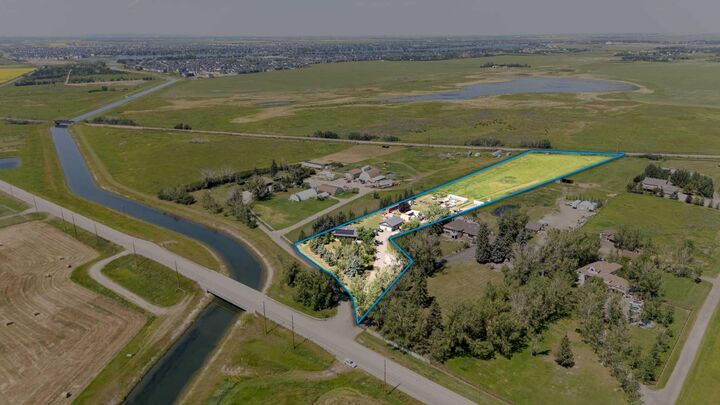Property Photo: 280166 Twp Rd 240 AB T1X 0K5