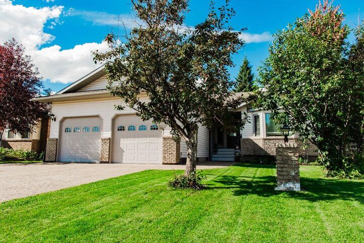 Property Photo:  9310 Wedgewood Drive N  AB T8W 2G5 
