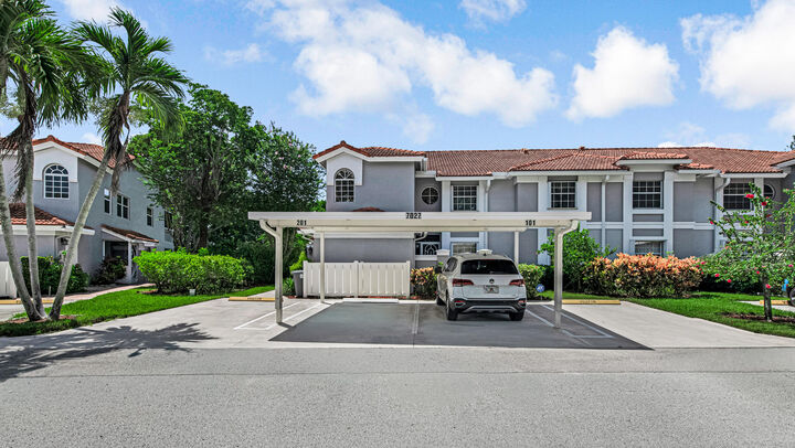 Property Photo: 7027 Summer Tree Drive 201 FL 33437