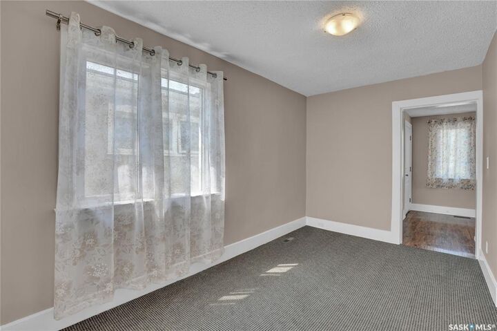 Property Photo:  2022 Elliott Street  SK S4N 3G9 