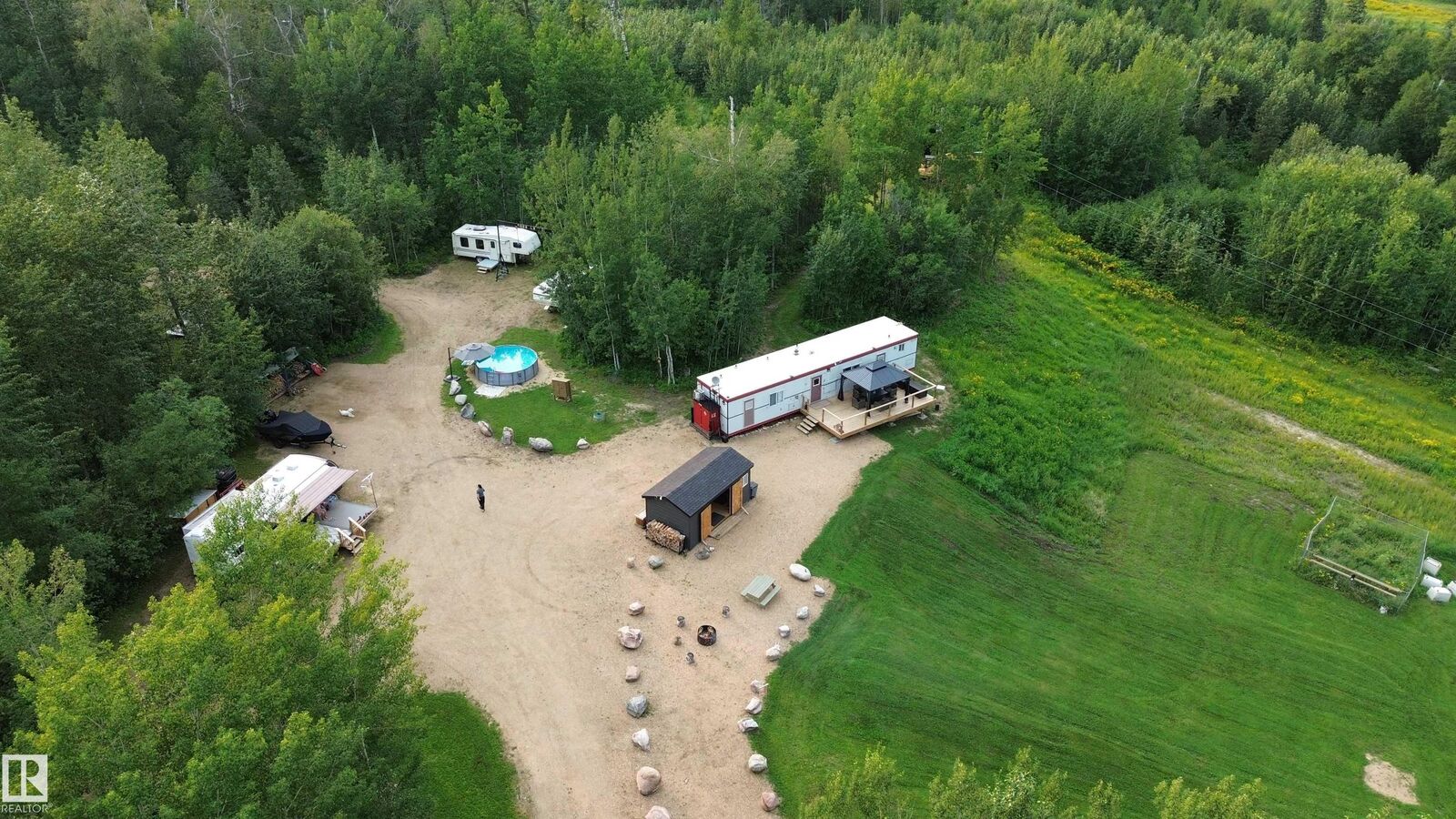 Property Photo: 243071 Twp Rd 664 AB T9S 1R8
