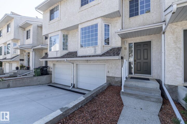 Property Photo: 9703 174 Street NW 11 AB T5T 6C5
