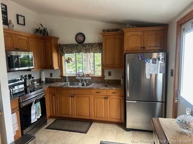 Property Photo: 339 Lowell Street NB E2M 2H6
