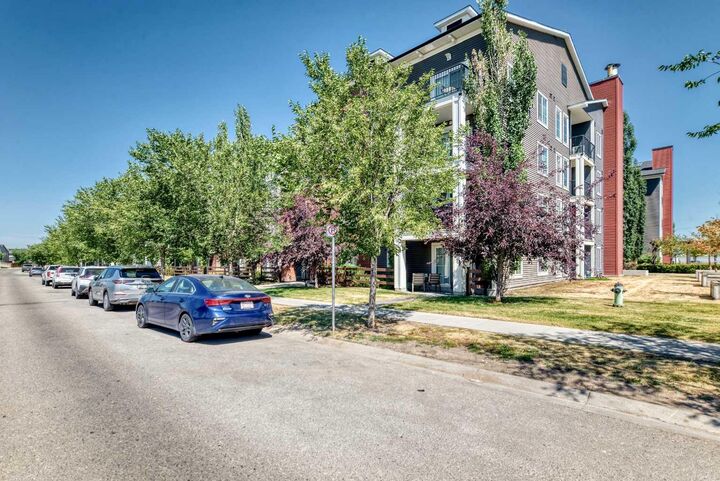 Property Photo:  755 Copperpond Boulevard SE 5102  AB T2Z 4R2 