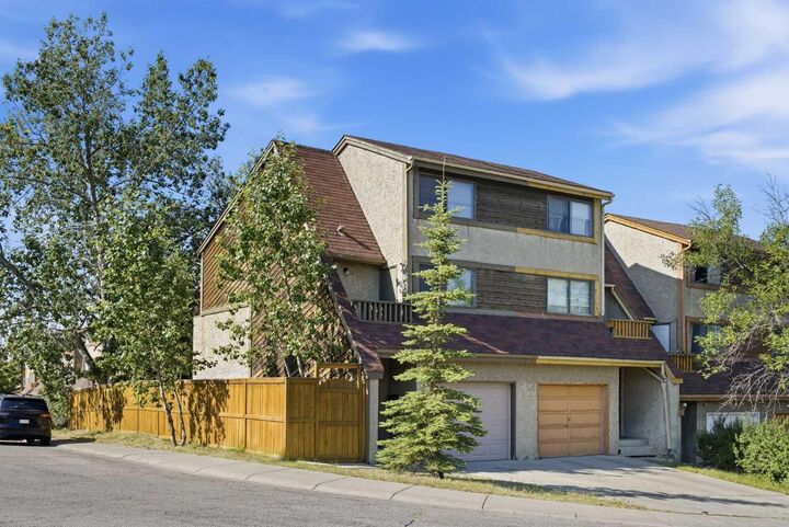 Property Photo: 7003 Ranchero Road NW AB T3G 1J6