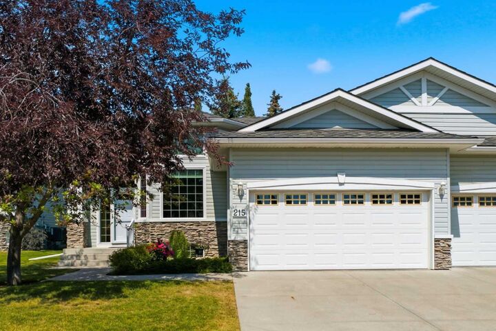 Property Photo: 215 Rocky Ridge Villas NW AB T3G 4R2