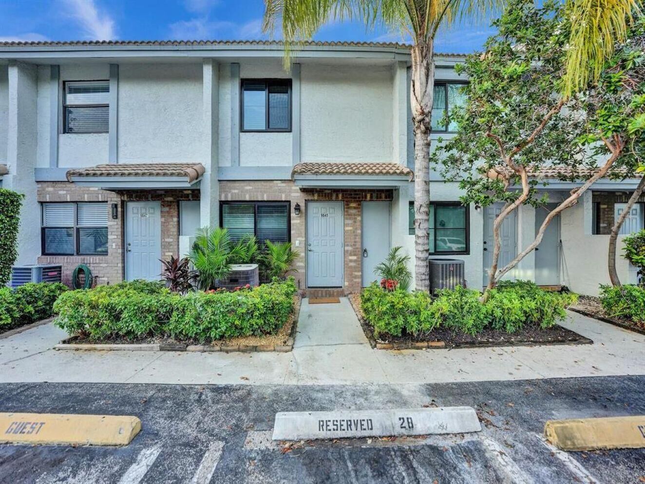 Property Photo:  9845 Riverside Drive 8-28  FL 33071 