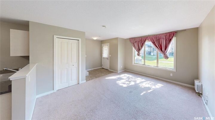 Property Photo:  5055 James Hill Road 110  SK S4W 0B9 