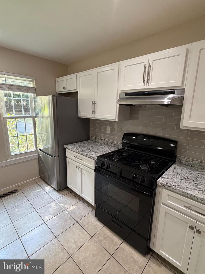 Property Photo: 14246 Long Green Drive MD 20906