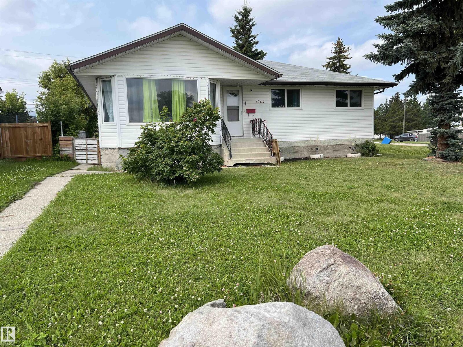 Property Photo: 4764 43 St. AB T7A 1G1