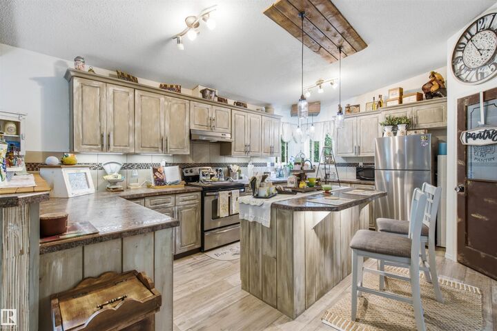 Property Photo:  #116 59526 Hwy 657  AB T9N 2G3 