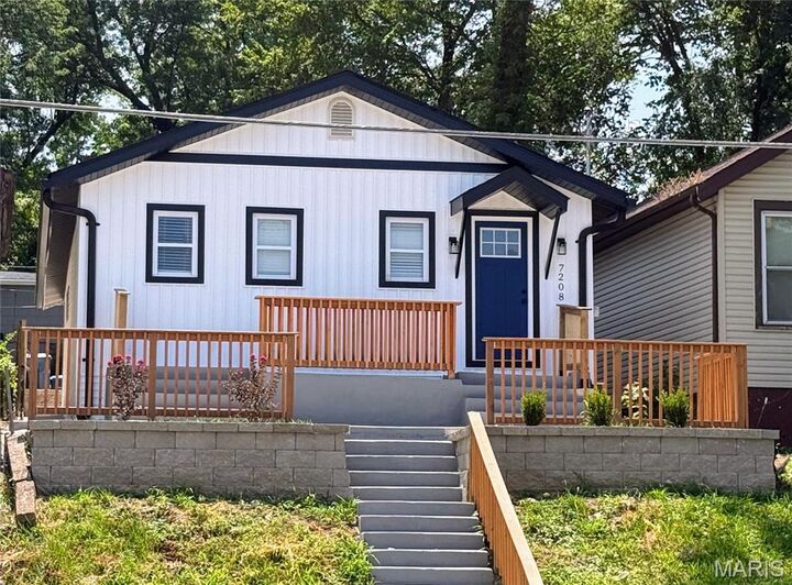 Property Photo:  7208 Page Avenue  MO 63133 