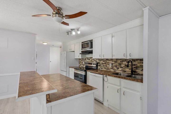 Property Photo: 34 Burroughs Place NE AB T1Y 6K5