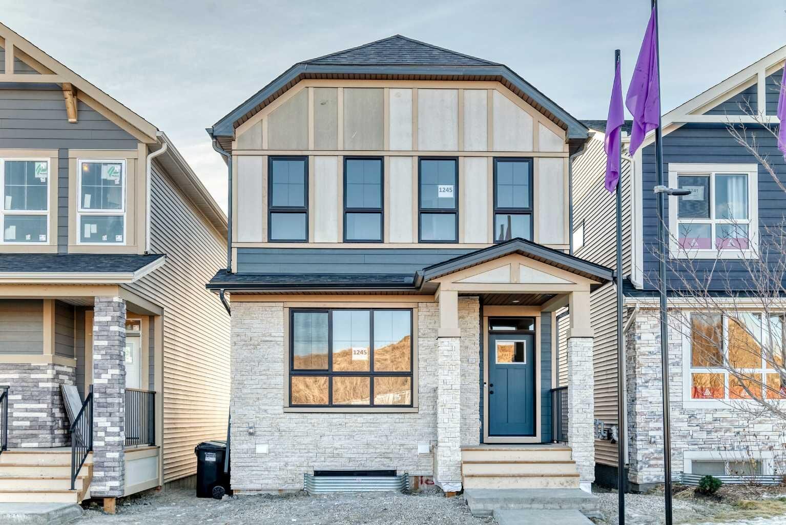 Property Photo: 1245 Creekview Drive SW AB T2X 5Y7