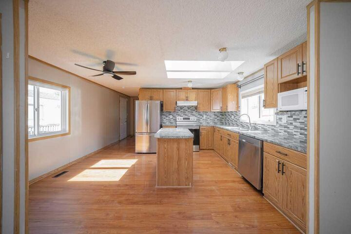 Property Photo: 216 Cree Road AB T9K 1X8