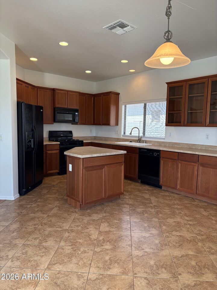 Property Photo: 8783 W State Avenue AZ 85305