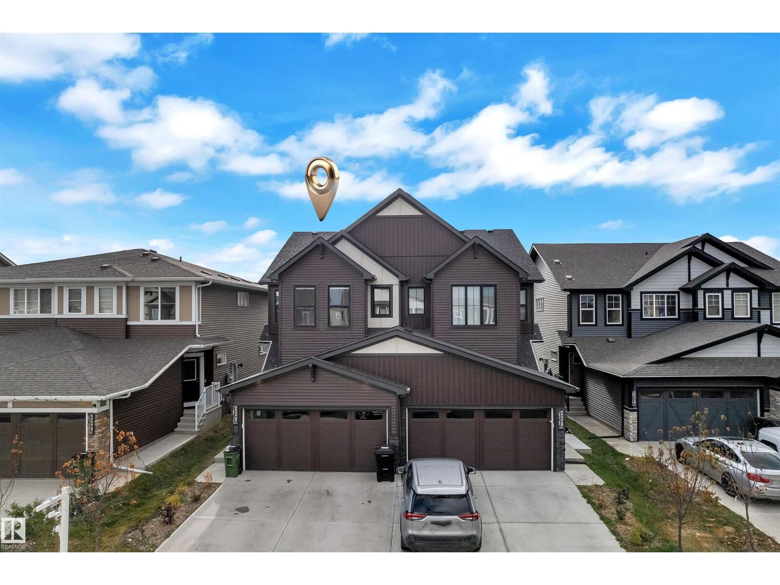 Property Photo: 226 Orchards Bv SW AB T6X 2G9