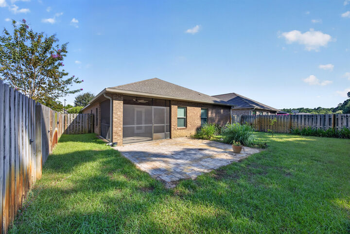 Property Photo:  726 Cocobolo Drive  FL 32459 