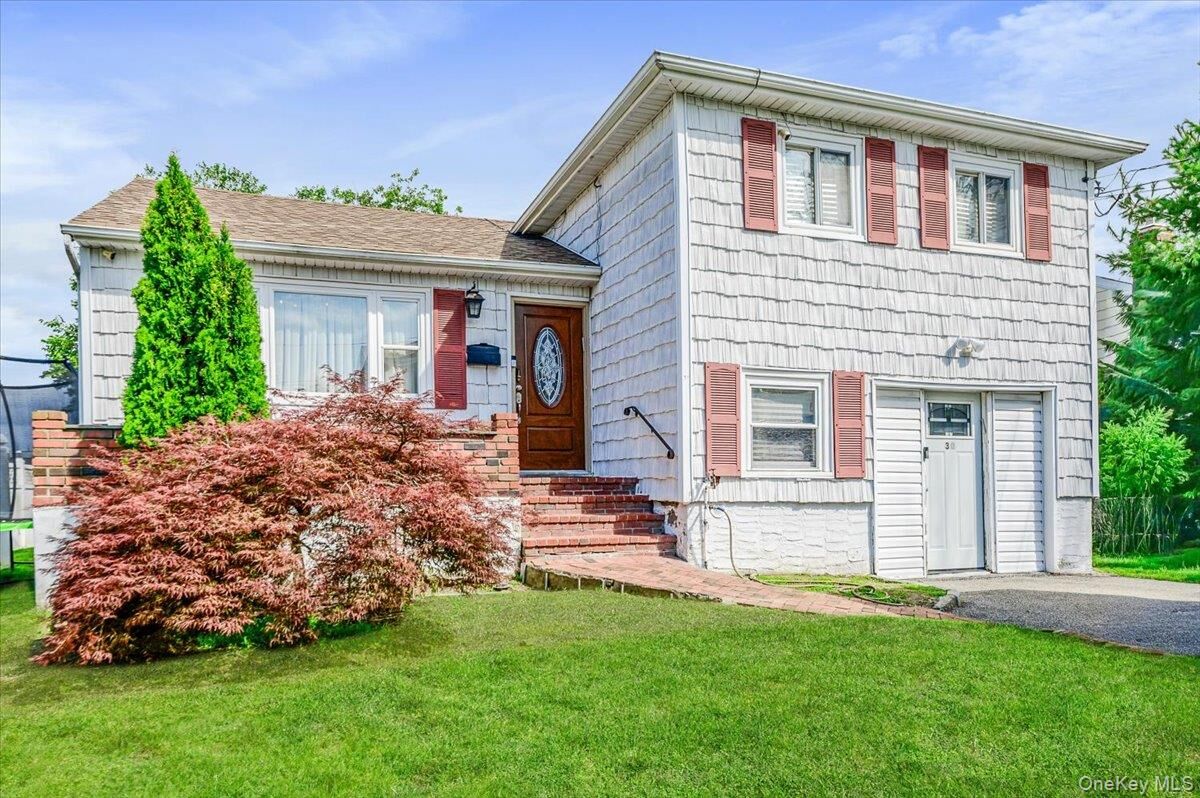 Property Photo: 30 Cheshire Road NY 11096