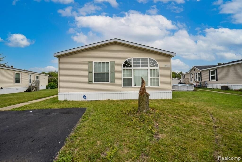 Property Photo:  9327 Greentree Drive  MI 48166 9561 