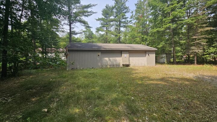 Property Photo:  98 West River Drive  MI 48624 