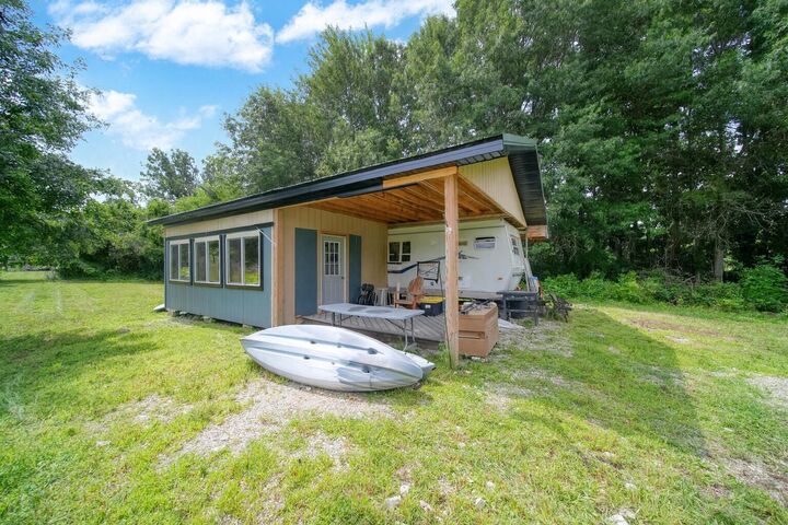 Property Photo:  7433 Milan-Oakville Road  MI 48160 