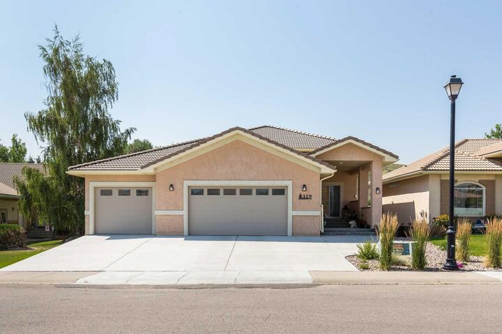 Property Photo: 319 Canyon Boulevard W AB T1J 6V2