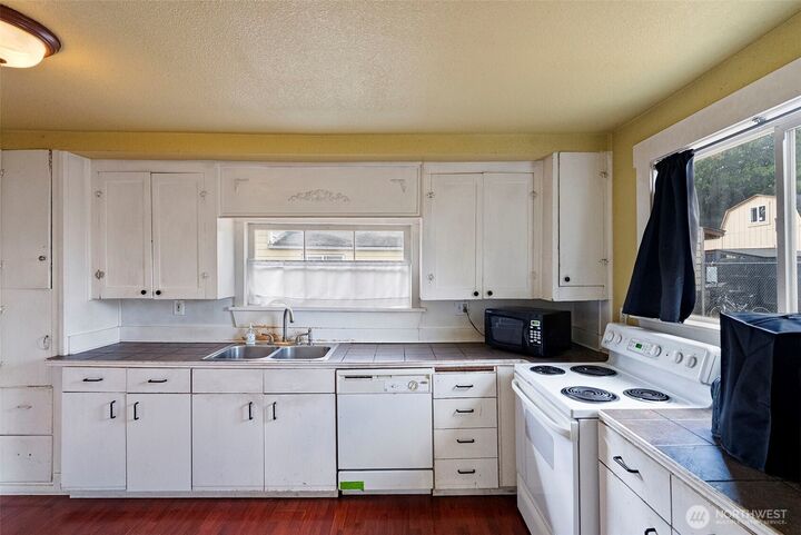 Property Photo: 6614 S Puget Sound Avenue WA 98409