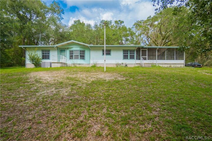 Property Photo:  9300 Cr 647A  FL 33513 