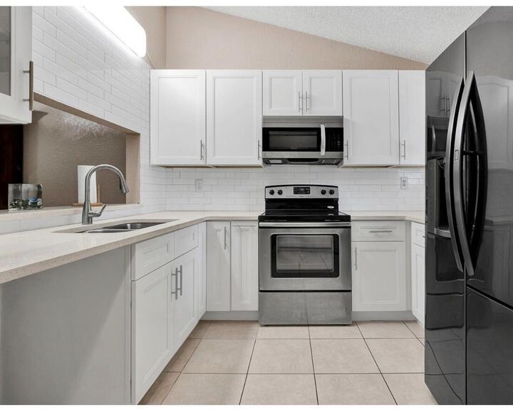Property Photo:  11665 NW 45th Street 11665  FL 33065 