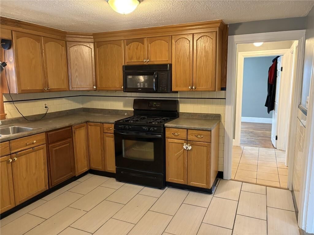 Property Photo: 610 Killingly Street 1 RI 02919
