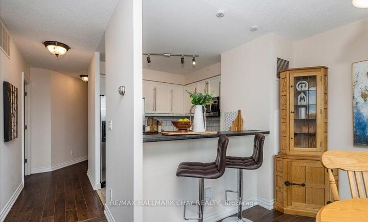 Property Photo:  140 Dunlop Street E 1202  ON L4M 6H9 
