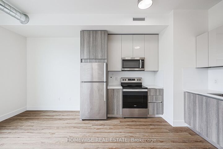Property Photo:  3020 Dundas Street W 204  ON M6P 1Z3 