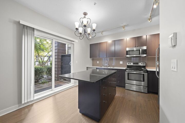 Property Photo:  13740 75A Avenue 104  BC V3W 0E8 