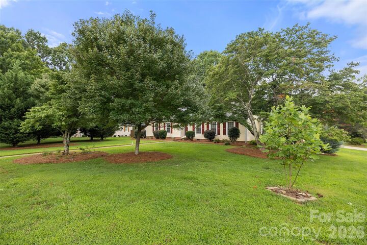 Property Photo:  3701 Princeton Drive  NC 28056 