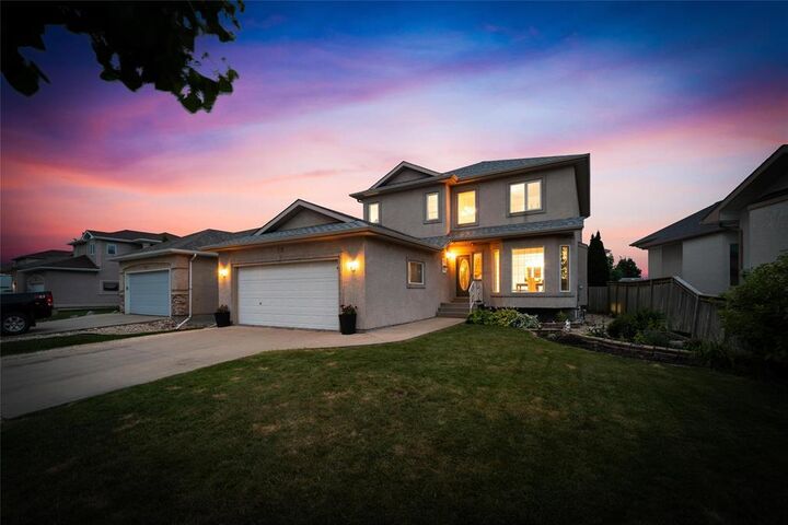 Property Photo: 211 Baisinger Drive MB R2N 4H7
