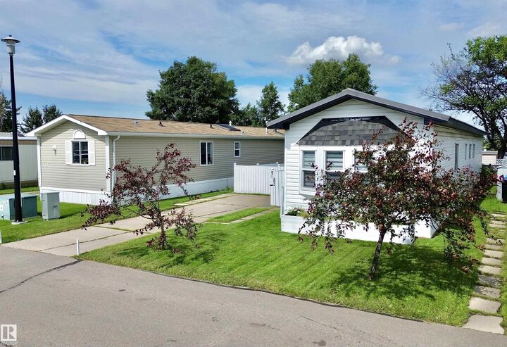 Property Photo:  1410 Jubilee Drive  AB T8H 1L7 