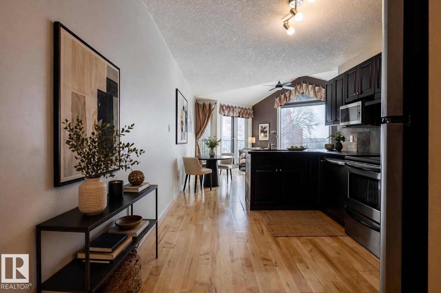 Property Photo: 9336 Jasper Avenue NW 304 AB T5H 3T5