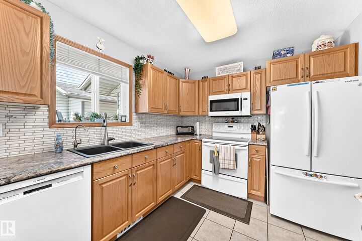 Property Photo:  4807 43A Avenue 204  AB T9E 8J6 