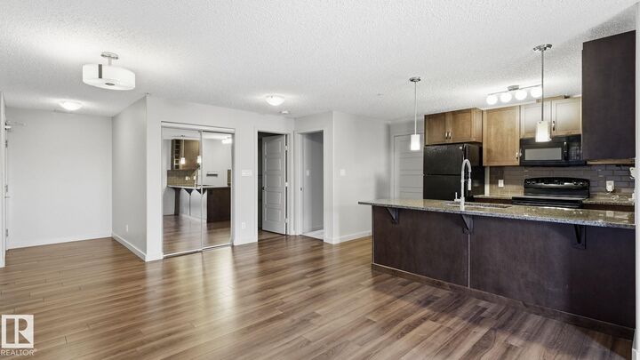 Property Photo: 7805 71 Street NW 361 AB T6B 3V6