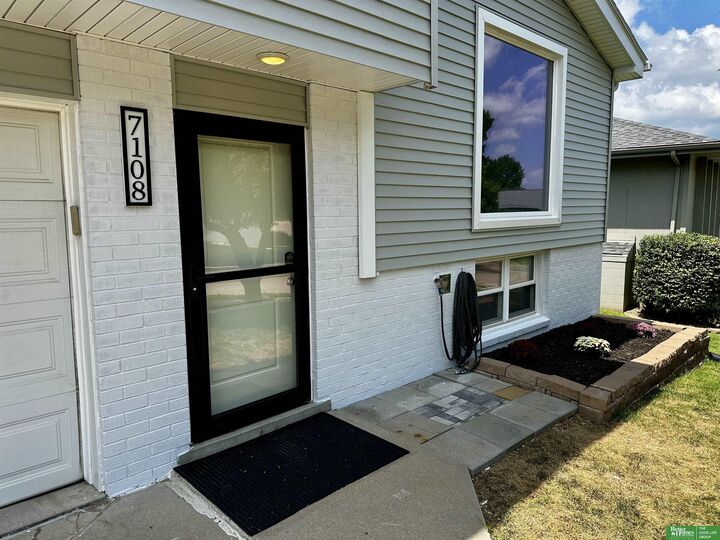 Property Photo: 7108 S 128th Street NE 68138