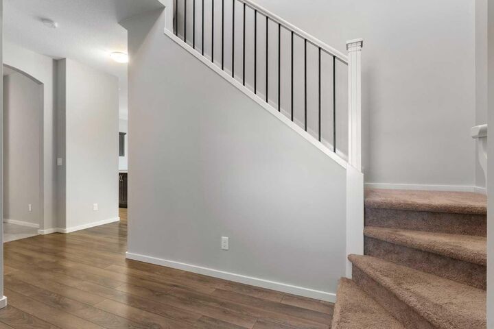 Property Photo:  143 Cooperswood Place SW  AB T4B 3Y7 