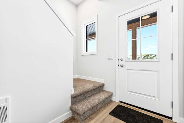 Property Photo: 40 Creekside Way SW 302 AB T2X 6E2