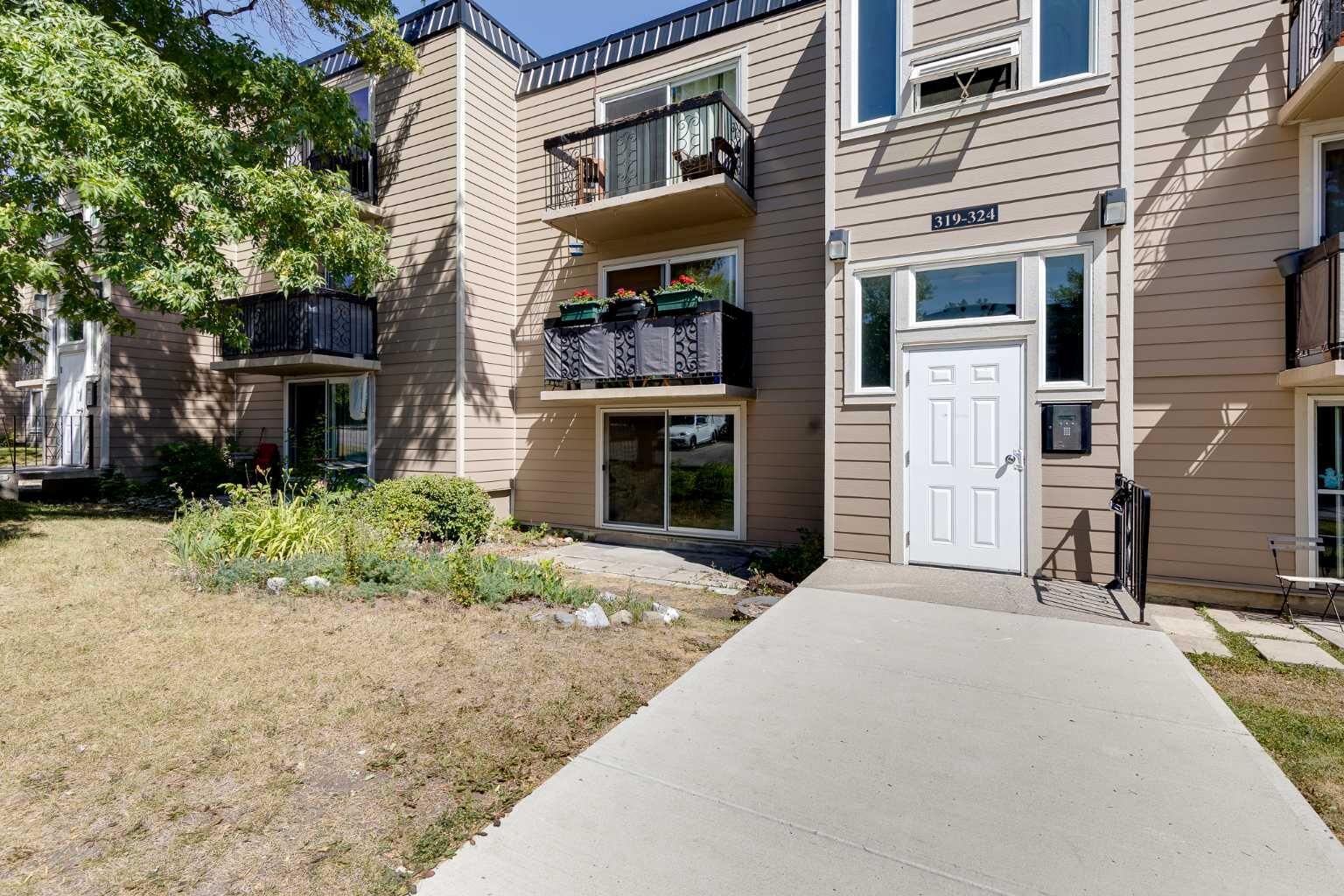 Property Photo:  315 Heritage Drive SE 319  AB T2H 1N2 