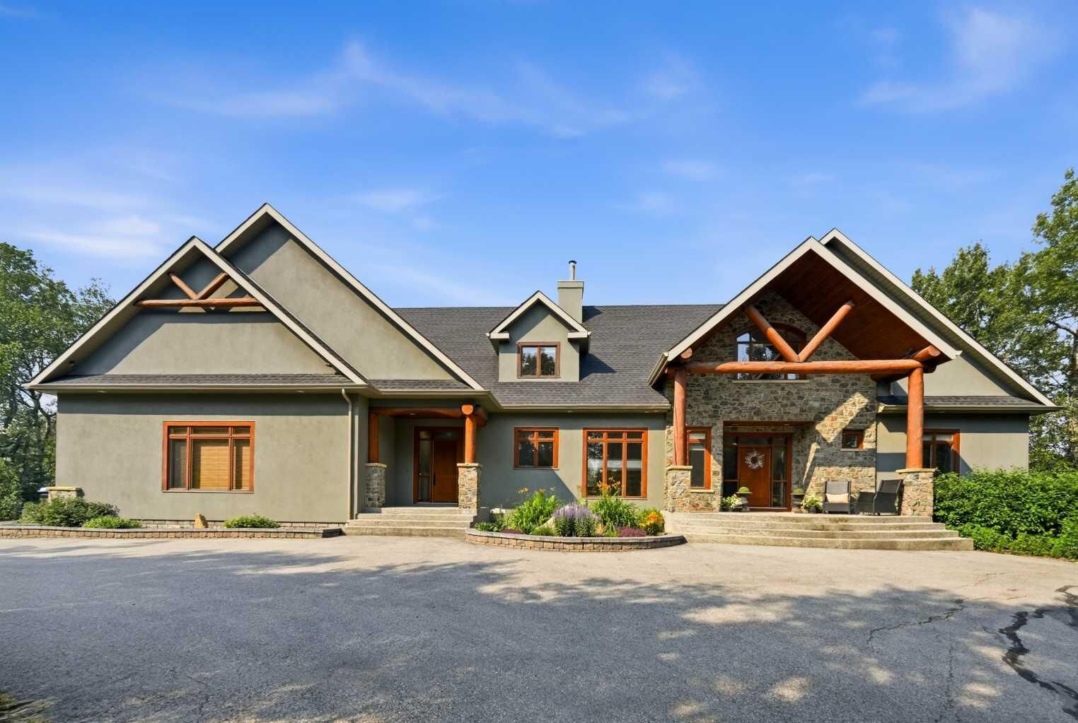Property Photo:  31250 Woodland Way  AB T3R 1G5 