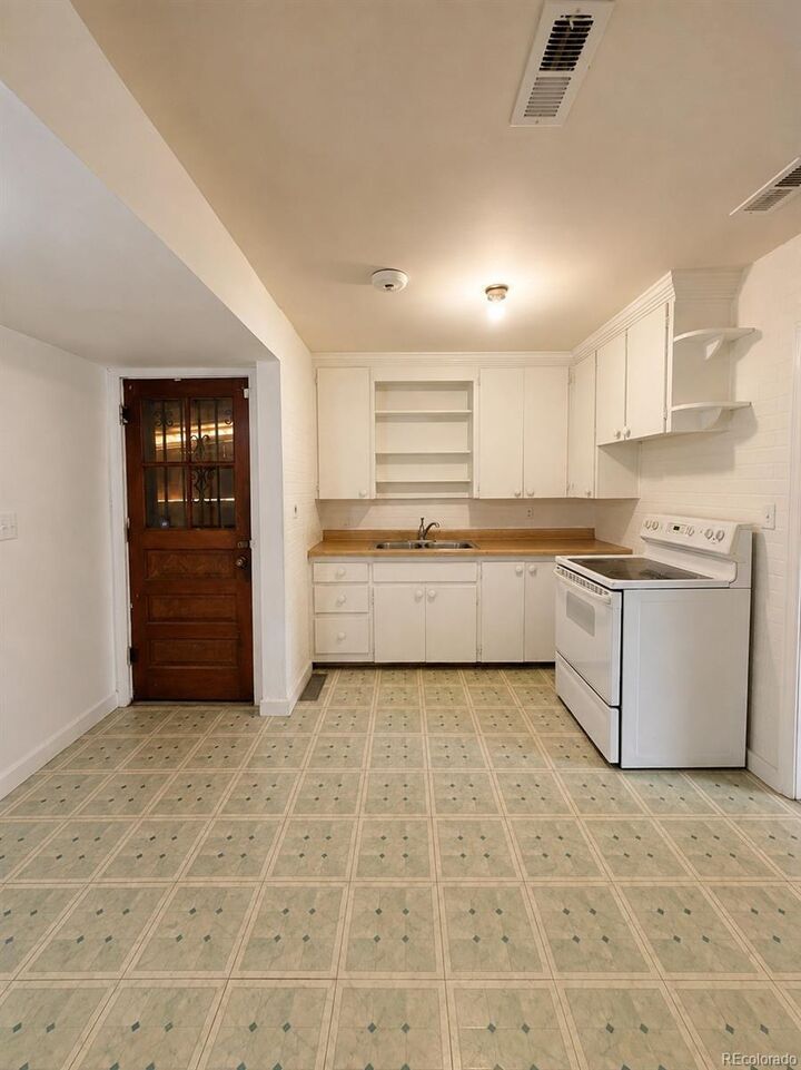 Property Photo: 1132 Moline Street CO 80010